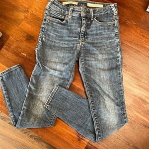 Anthropologie Pilcro high-rise denim leggings.